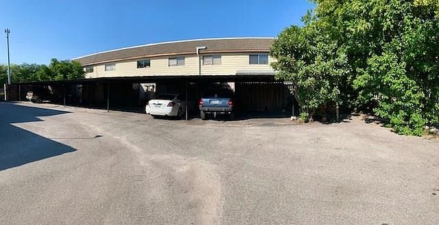 Assigned parking for 2 cars under carport. Corner lot.