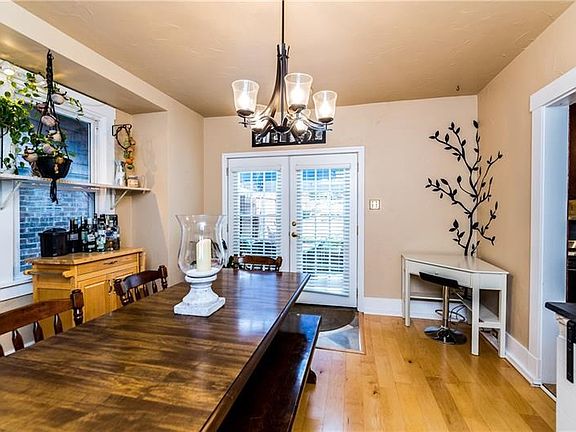 14x13 Dining Room has French doors leading to private fenced in back yard.