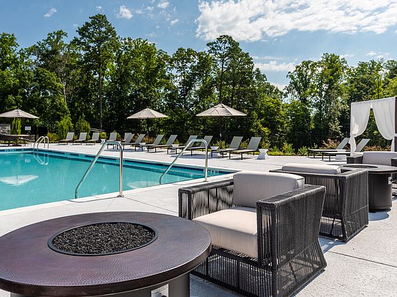 Relax in style at this exquisite poolside escape, perfect for sunbathing and unwinding.