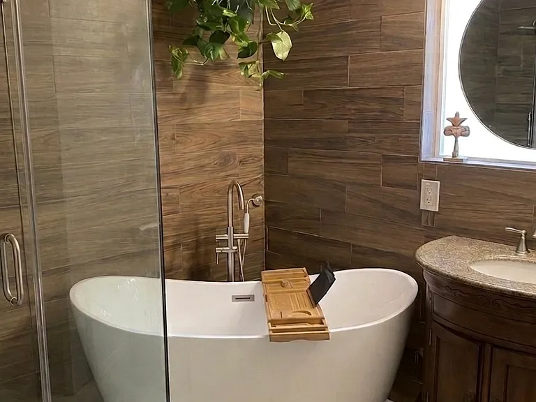 Bathroom 1 with bathtub and shower