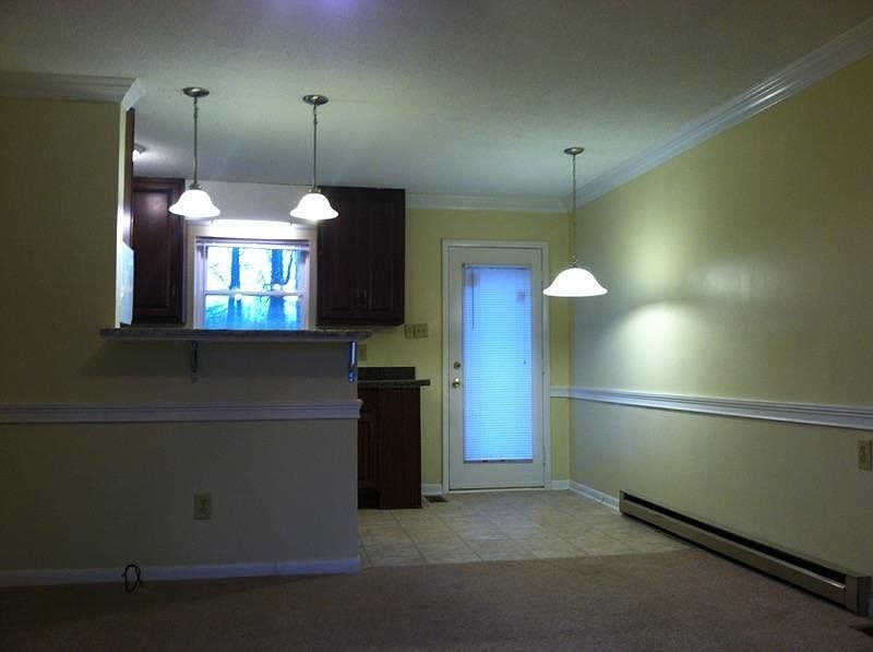 Living Room/Eat-in Area/Entrance to Back Patio