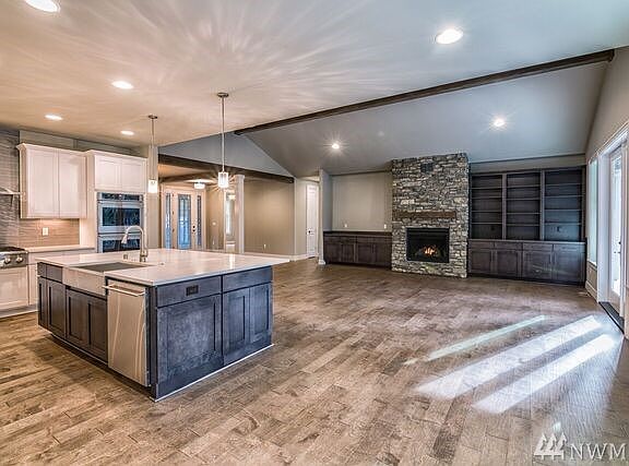 Beautiful built in shelving. Flooring is stunning!
