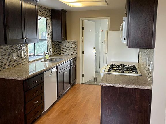 view of Kitchen. door leads to garage