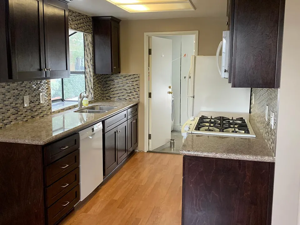 view of Kitchen. door leads to garage