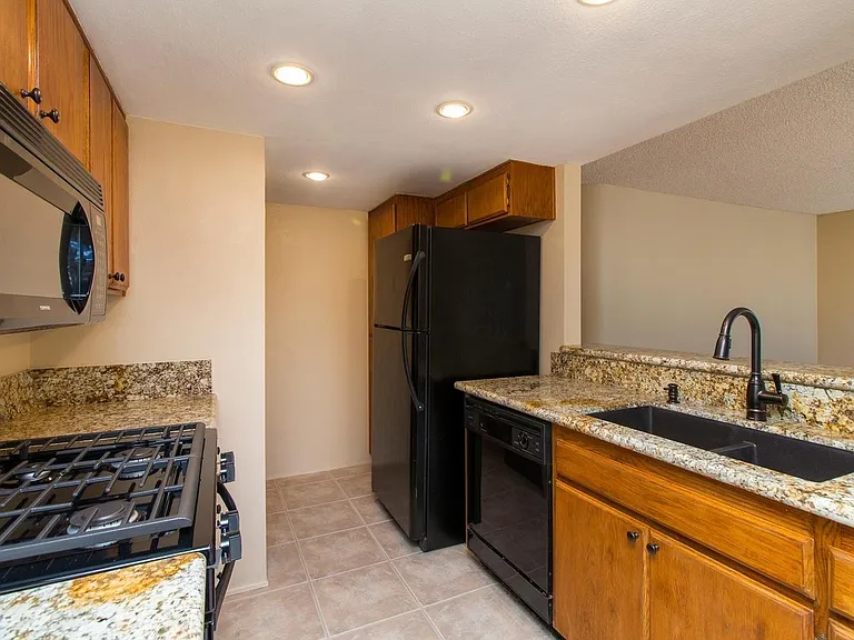 9424 Twin Trails Dr #103 — Photo 1