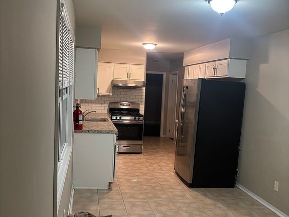 Walk through entrance into kitchen