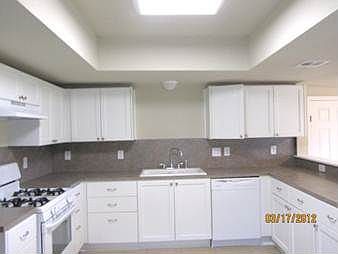 Kitchen: New Cabinets,Gas Stove, Dishwasher,Countertop, Disposal, Ceramic Tile