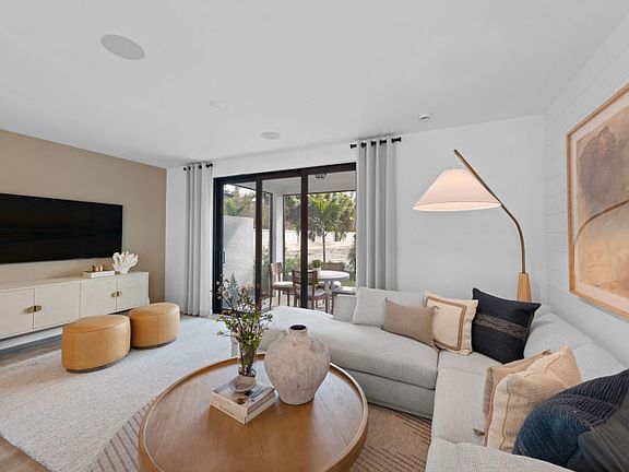 Model Representation - Spacious gathering room with an open concept layout