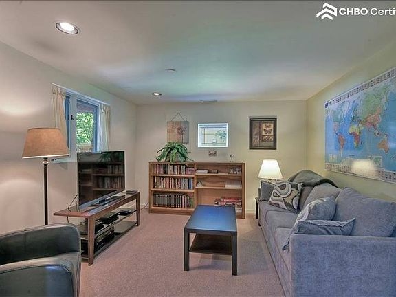 Living room area complete with movies, books