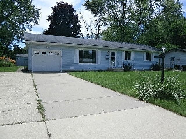 Oversized driveway with 1 car attached garage