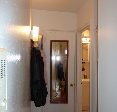 Hallway leading to bath