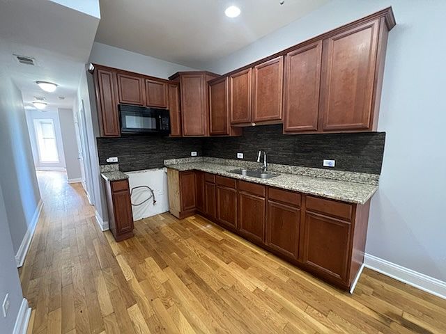 1st image of 6542 S Langley Ave #2