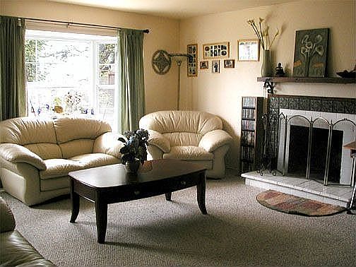 Tiled Fireplace in Living Room w/ window seat