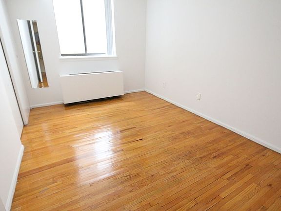 5th image of 121 E 12th St APT 3E