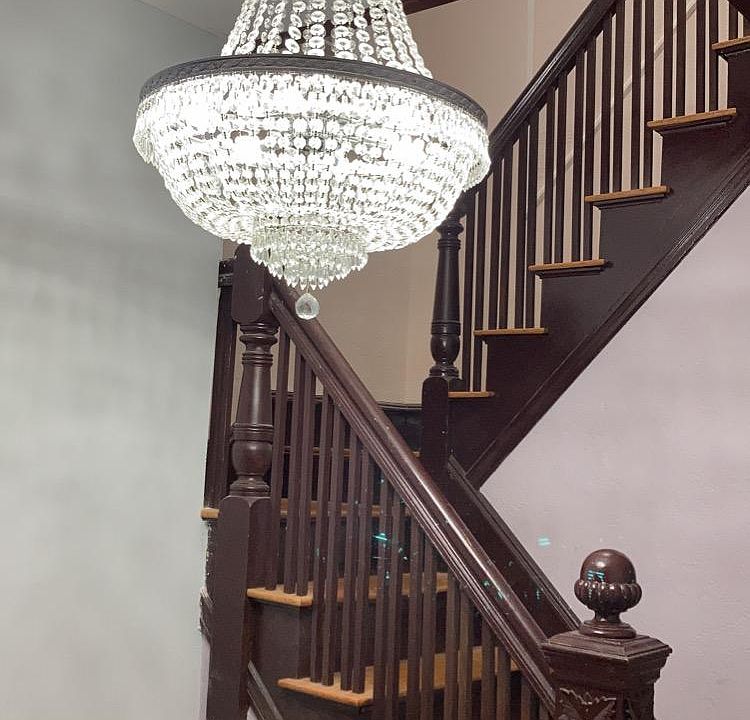the stairs to get upstairs from the front door