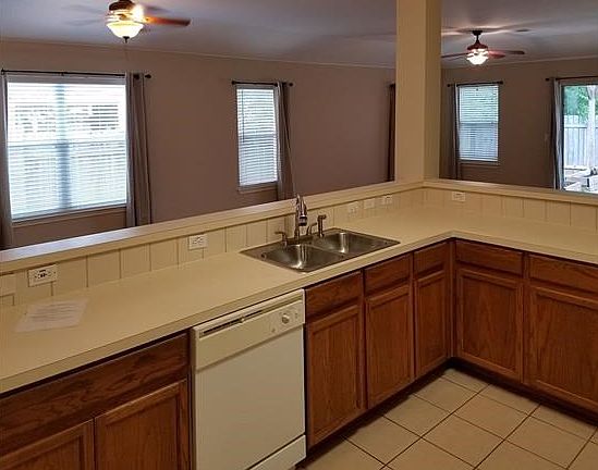 Loads of Counter Space and Cabinets. Open to Living and Dining Areas.