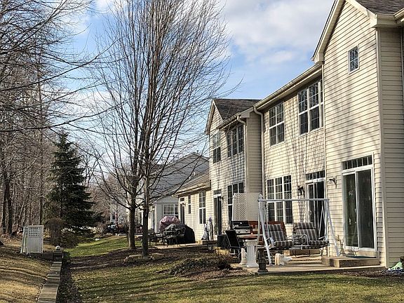 Enjoy outdoor grilling on concrete patio~