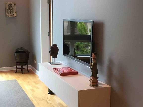 tv with floating tv cabinet