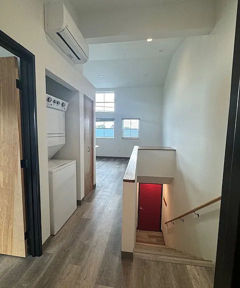 stairs to landing and laundry right off bedroom
