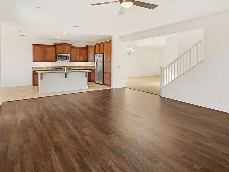 Formal Family Room Bright and Open Design Concept toward the Formal Living Room, Kitchen and Stairs