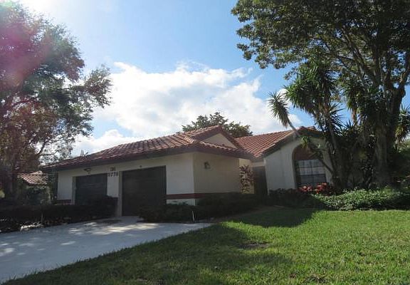 Home For Sale In Palm Chase Lakes