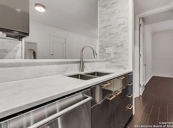 5th image of 7711 Broadway St