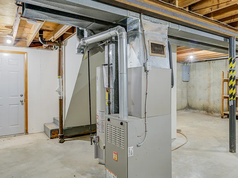 HVAC unit - and the walk-out basement door to the rear patio.
