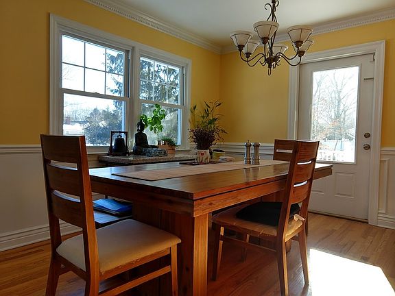 Bright dining room with access to a large deck