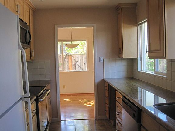From front door to dining room through kitchen