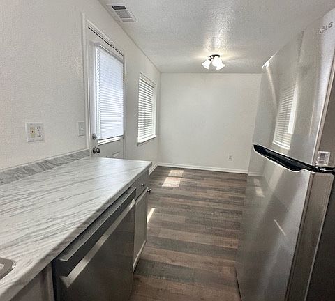 Kitchen looking to Dining Area