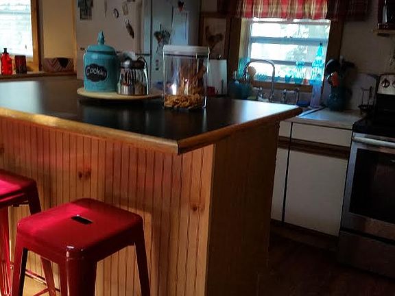 Island with bar stools