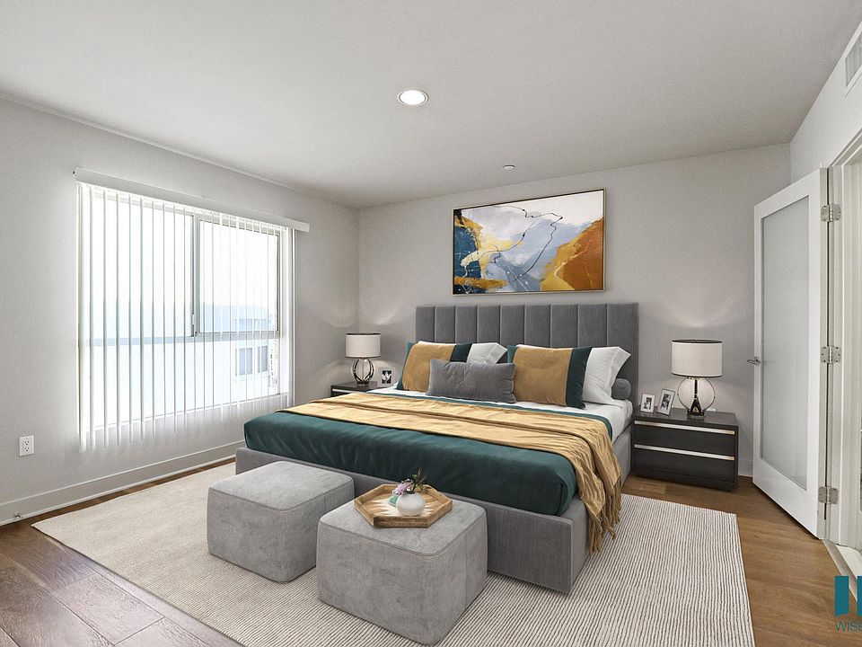 Bedroom with Recessed Lighting, Vinyl Flooring, Large Windows, and Bathroom