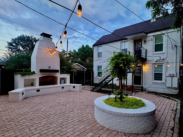 View from the gorgeous backyard courtyard looking over at the duplex unit.