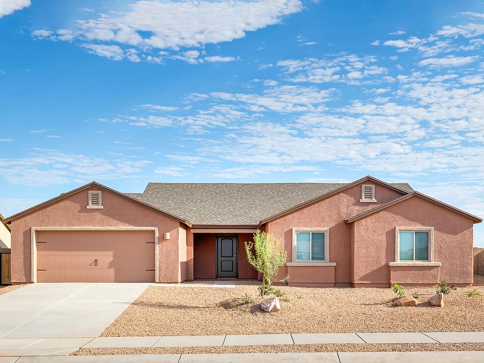 Giant one-story, four-bedroom home with covered porch and back patio