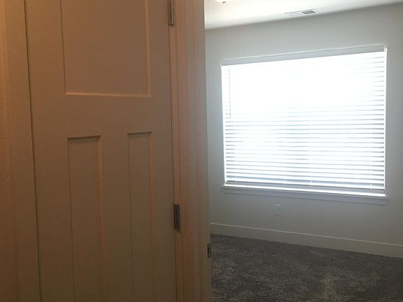 Hall closet next to Bedroom 2