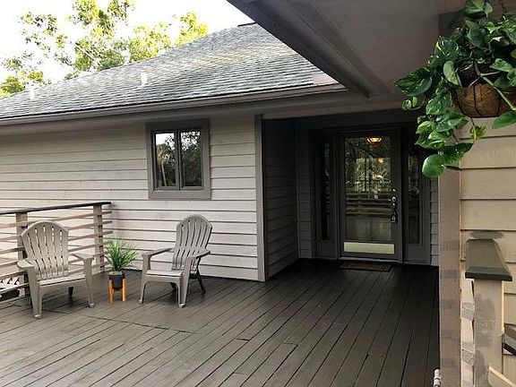FRONT DECK AND HOME ENTRANCE...
