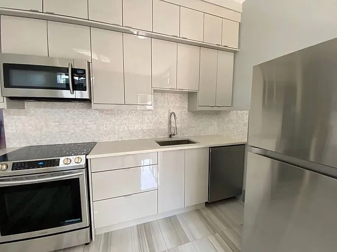 Building Photo - 1388 W 57th Ave #1A