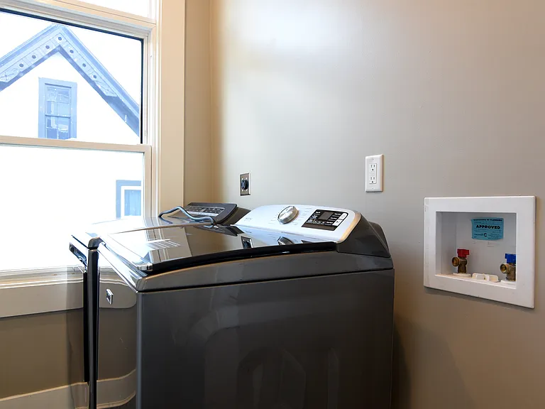 Laundry room, conveniently on second floor.