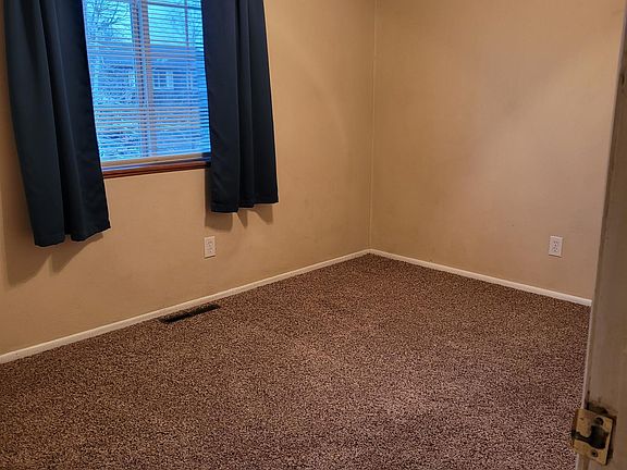 Bedroom on upper level with brand new carpet