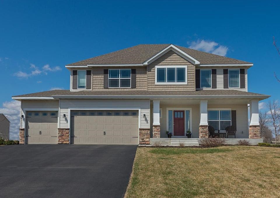 Former model home has many builder upgrades.  4 car garage has a center stall that is 40 feet deep for your trailer. Near the park and bus service to Waconia and Westonka schools.