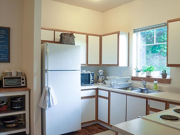 Kitchen with full-size fridge or similar