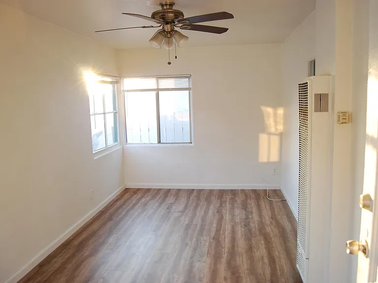 Wood flooring in livingroom and bedroom
