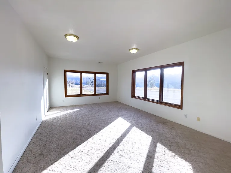 The sunroom provides a wonderful spot for exercise or gathering
