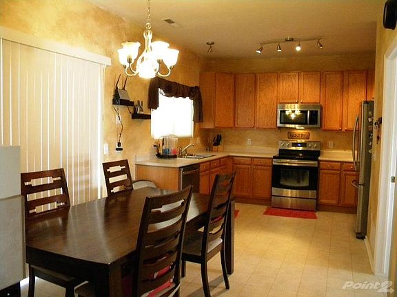 Kitchen and Dining Area with Walk-out