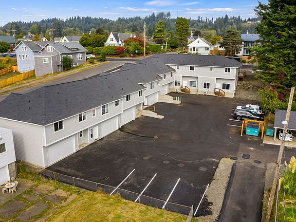 TWO CAR GARAGE AND RESERVED PARKING SPACES AT NO ADDITIONAL COST