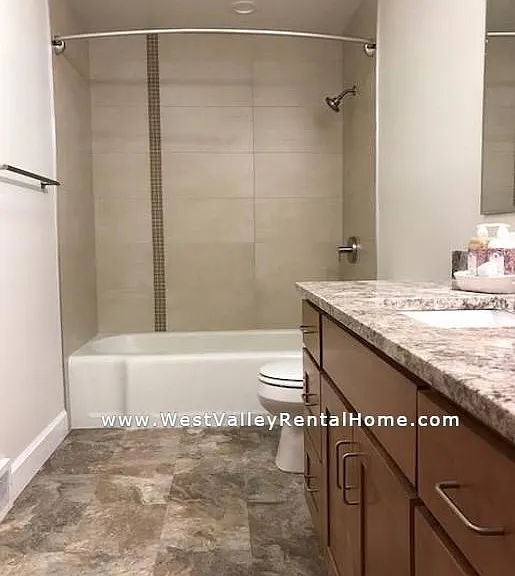 Brand NEW hall bathroom! Beautiful granite, flooring, new vanity, new bath & surround!