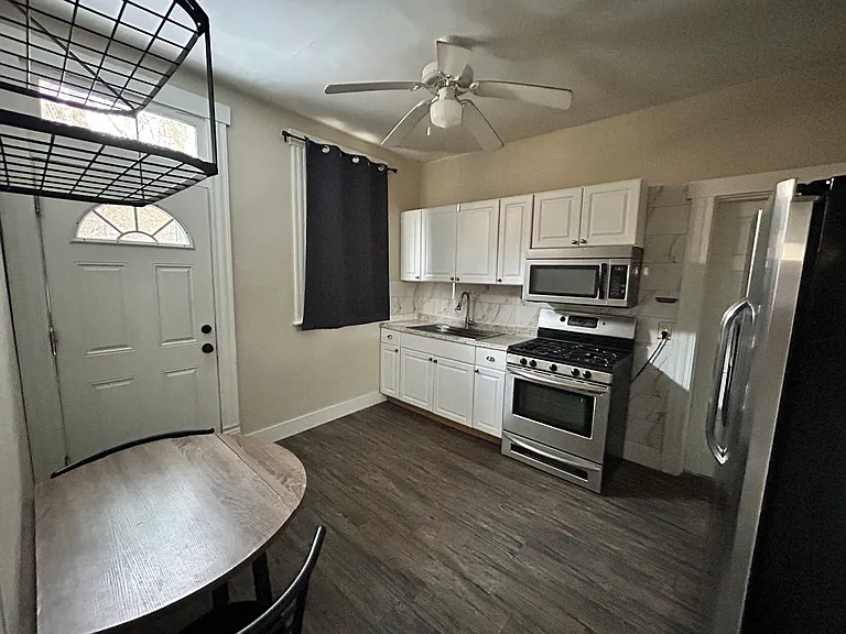 kitchen appliances - fridge, stove and microwave