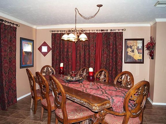 Large formal dining room is perfect for large gatherings or would also be a great study