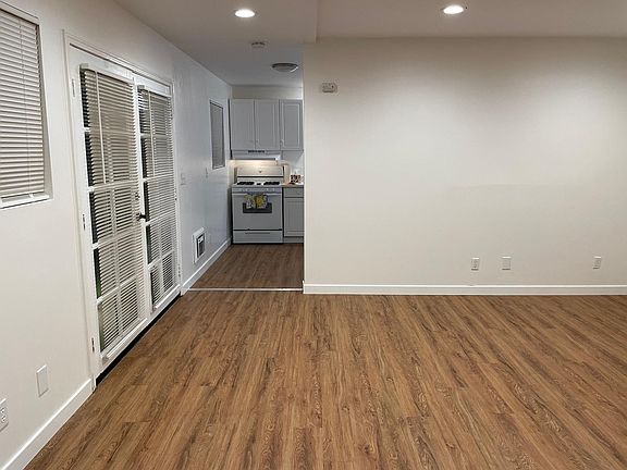 French doors for entrance
 opening up from side patio