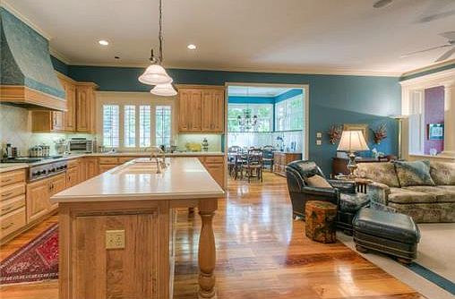 Wonderful hearth kitchen with gleaming hardwood floors.